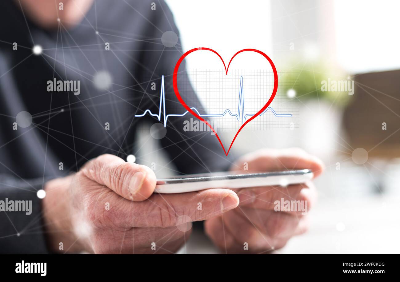 Hands of man holding a smartphone with medicine concept Stock Photo