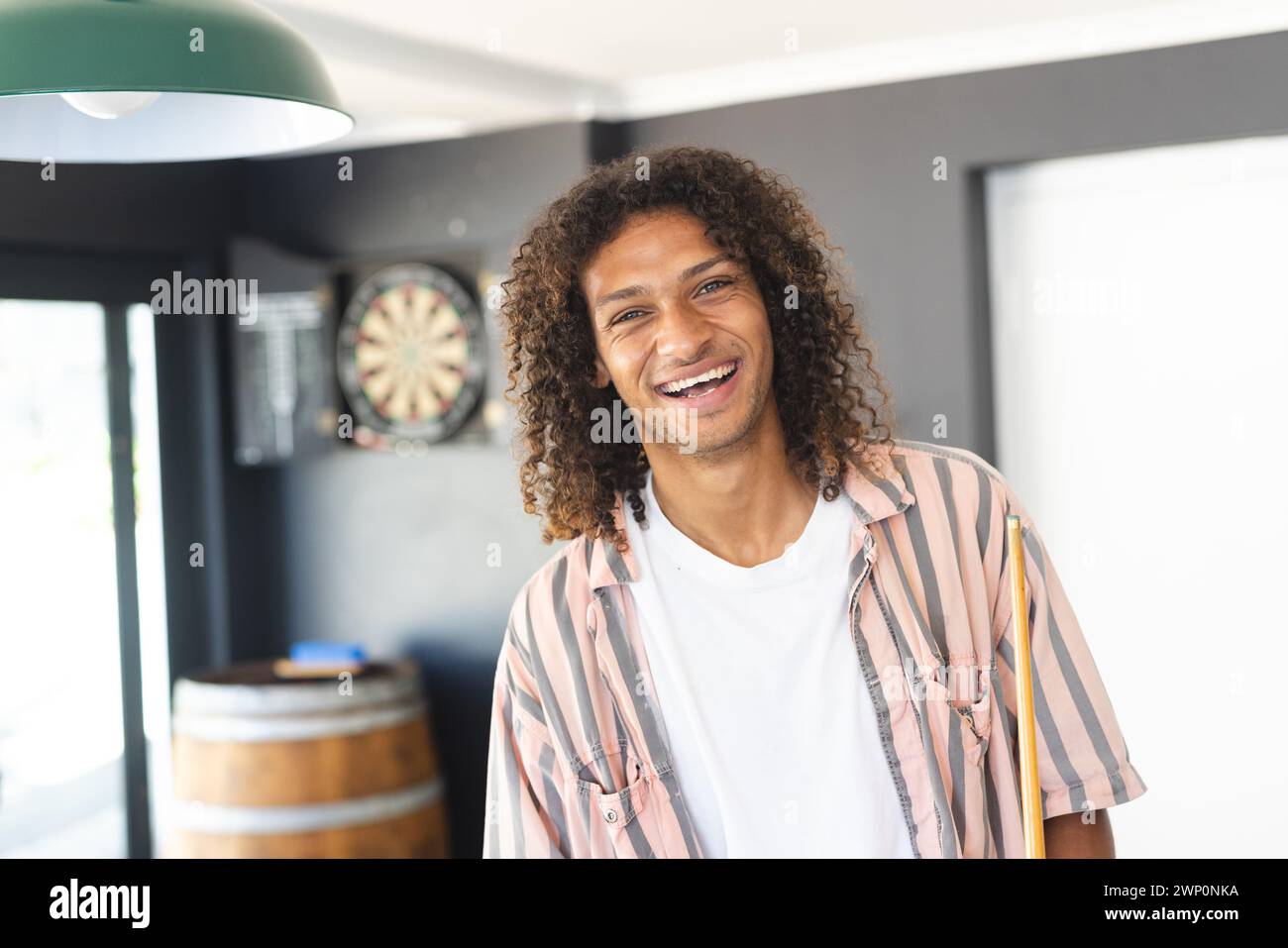 Stylish modern young curly man hi-res stock photography and images - Alamy