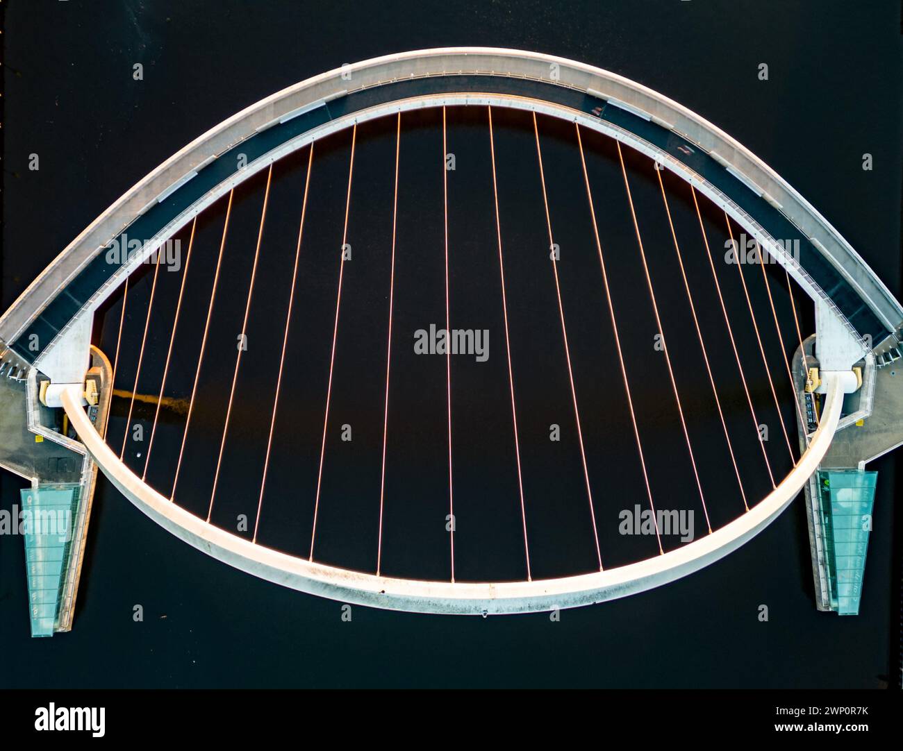Spectacular, abstract view looking directly down on of the Millenium Bridge in Newcastle on a sunny September dawn Stock Photo