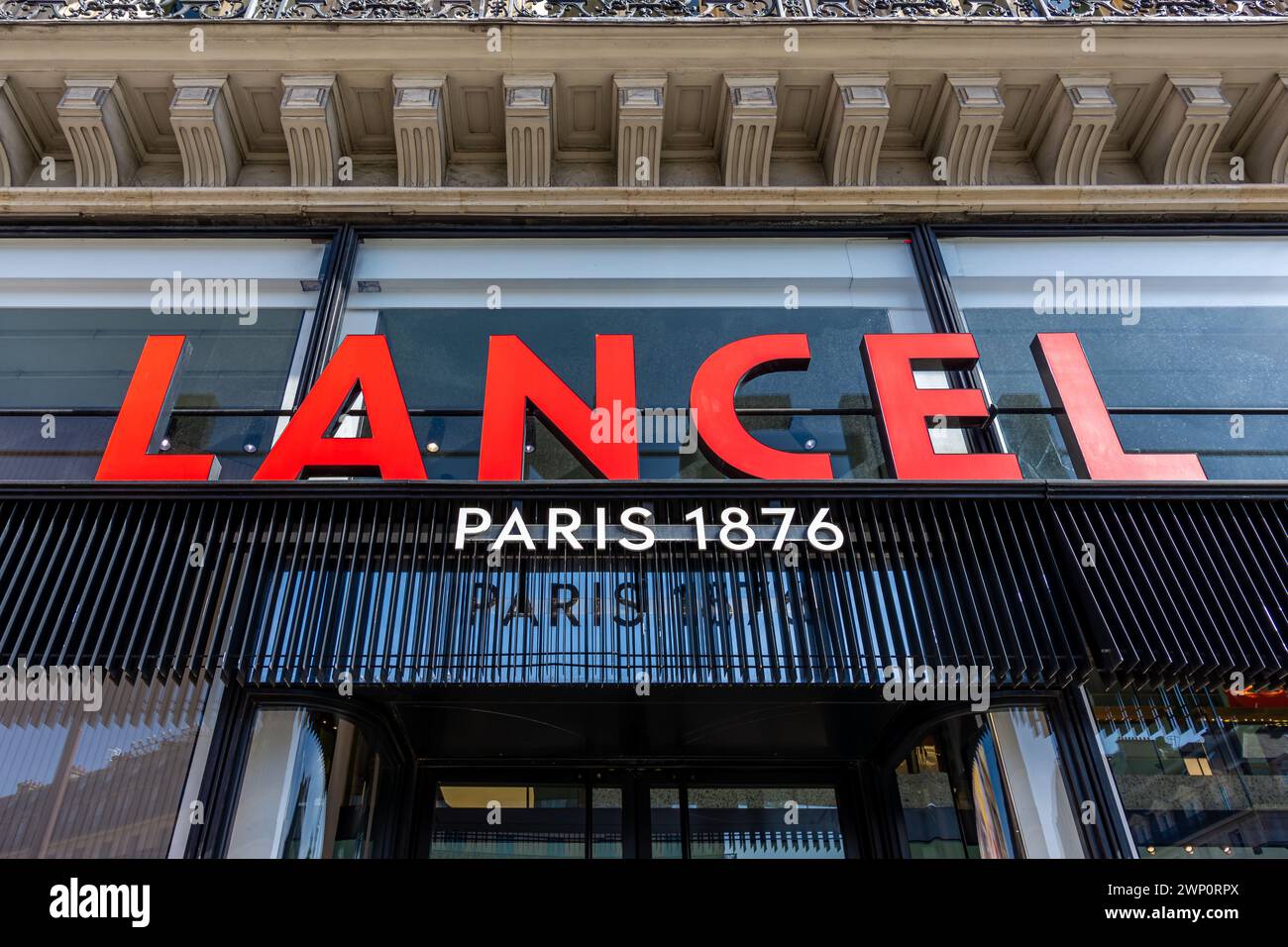 Sign and logo of the main Lancel boutique located Place de l'Opéra in Paris. Lancel is a French leather goods company founded in Paris in 1876 Stock Photo