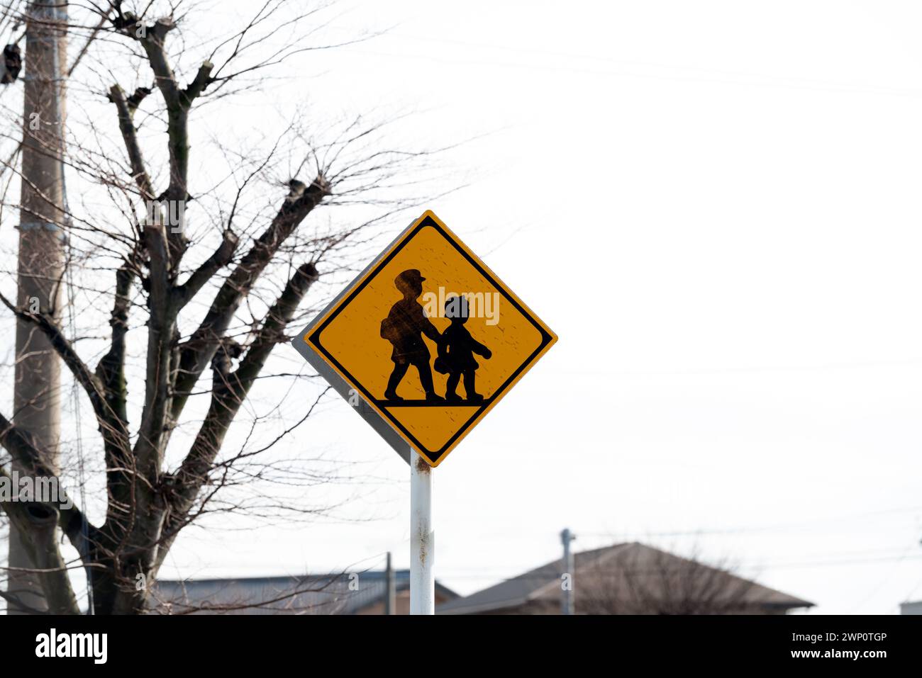 Children and students crossing road sign. Stock Photo