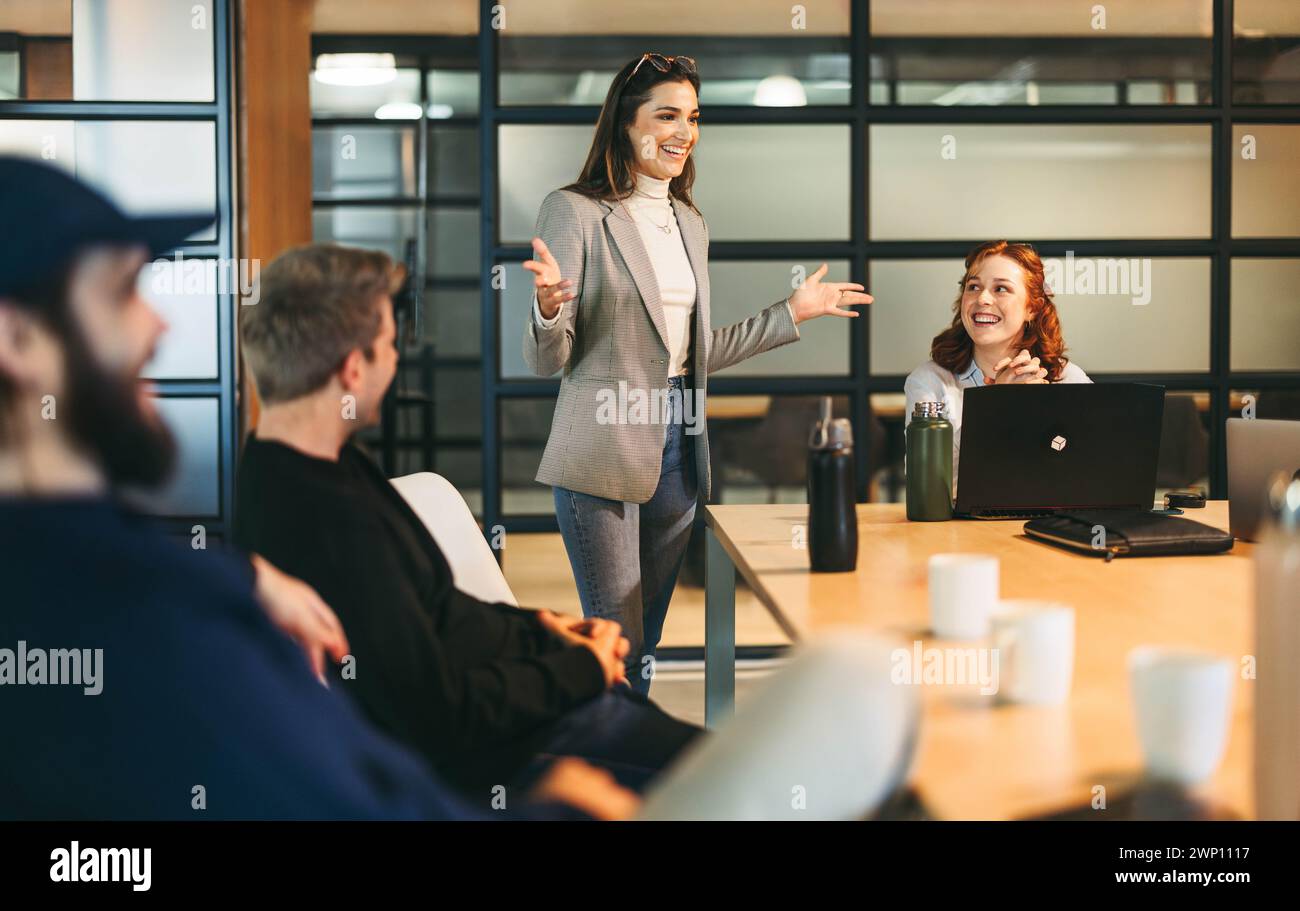 Diverse Professionals Both Men And Women Brainstorming And Discussing Diverse Professionals Both Men And Women Brainstorming And Discussing