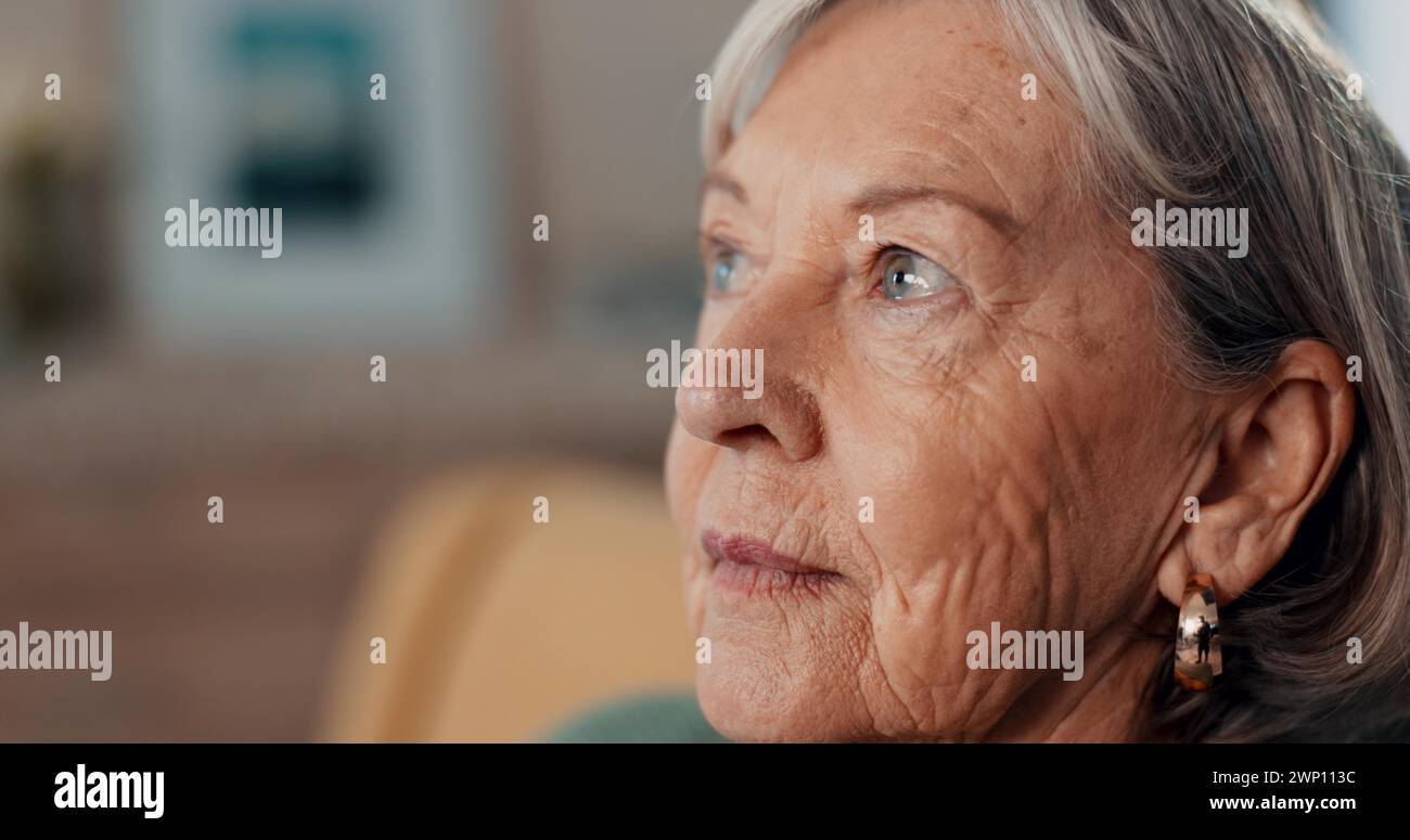 Thinking, depression and regret by old woman, home and retirement while feeling lonely. Remember, mental health and nostalgia by senior female person Stock Photo