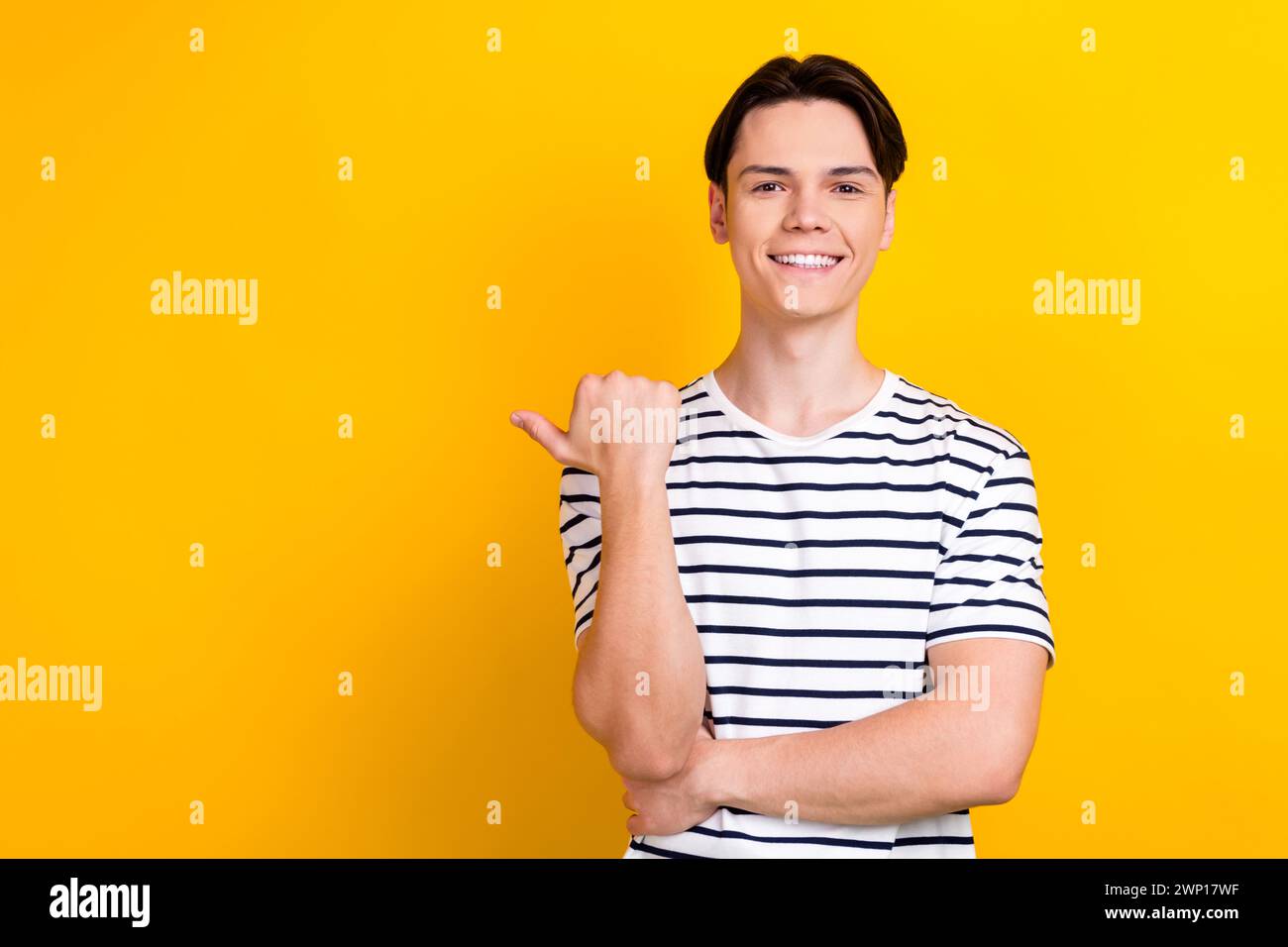 Portrait of toothy beaming guy wear stylish t-shirt indicating at ...