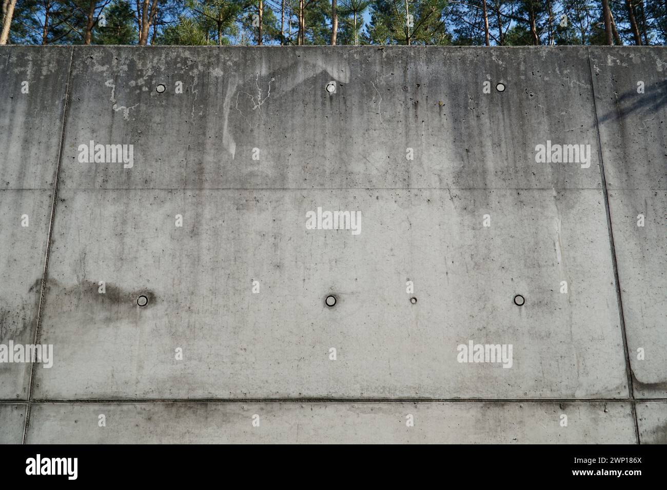 Concrete wall with round wholes Stock Photo