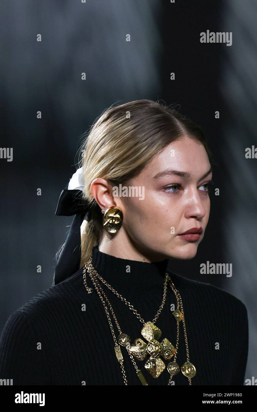 Gigi Hadid wears a creation as part of the Chanel Fall/Winter 20242025 readytowear collection