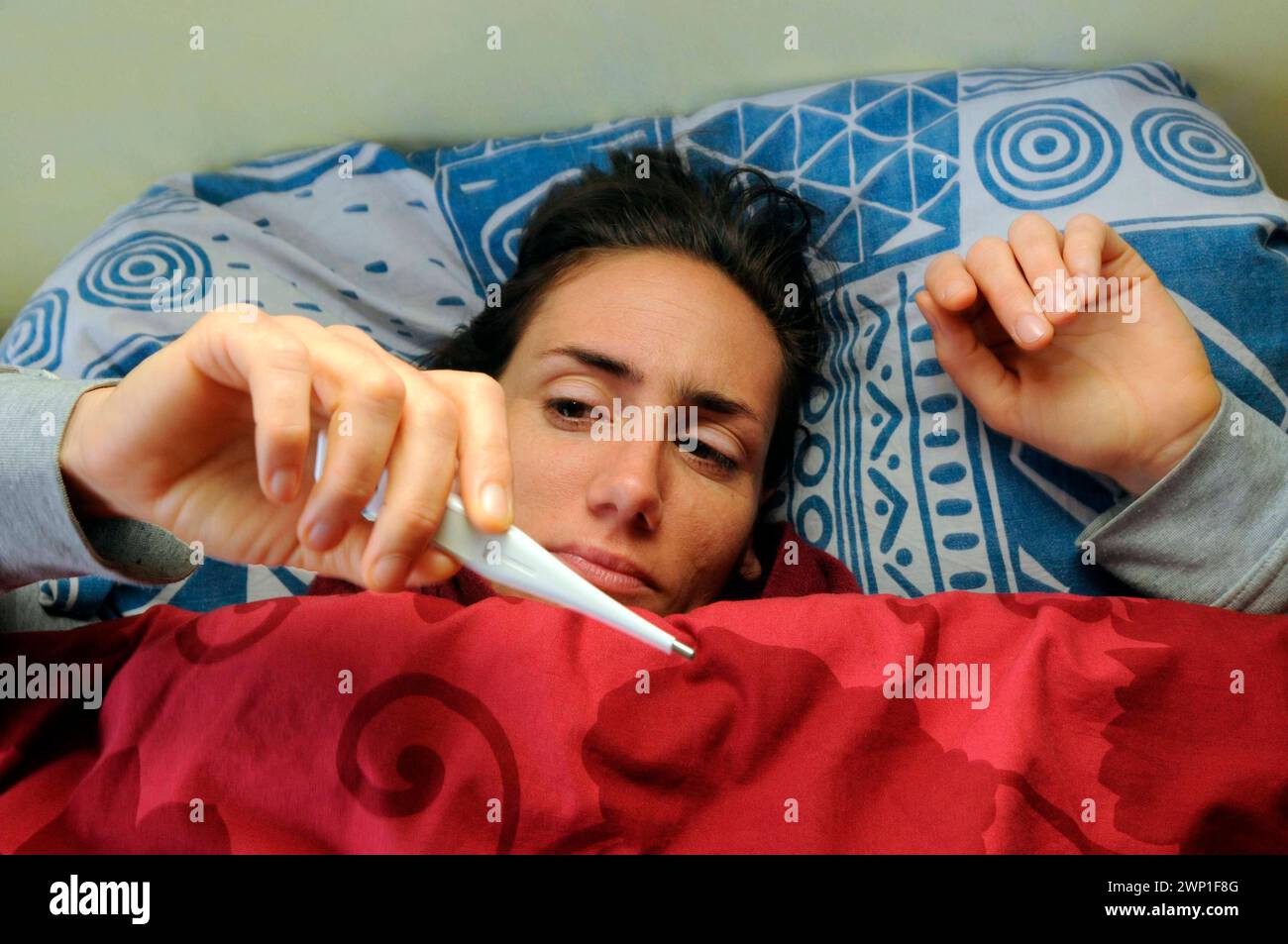 bed rest with a flu and fever, curing an illness bed rest with a flu and fever Stock Photo