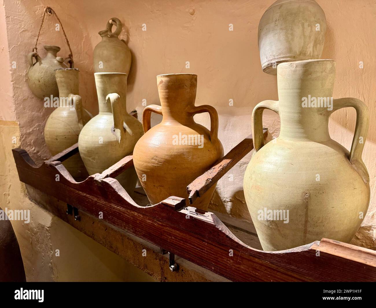 Four different clay jugs called cántaro in spanish. A traditional mud jar used to keep fresh water inside. Stock Photo