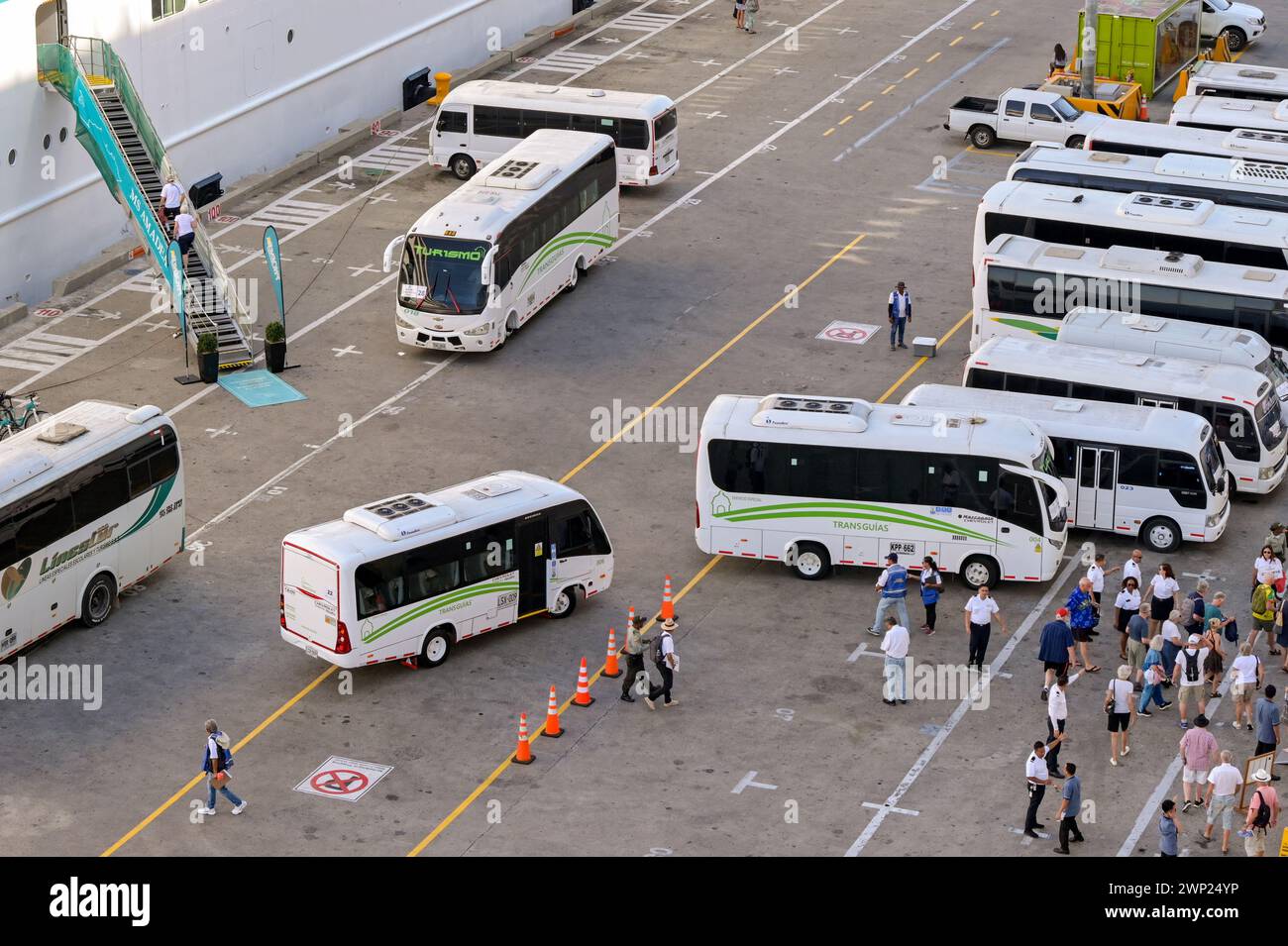 Cartagena, Bolivar, Colombia - 24 January 2024: Cruise ship passengers  waiting to board buses and coaches to take them on excursions. Stock Photo