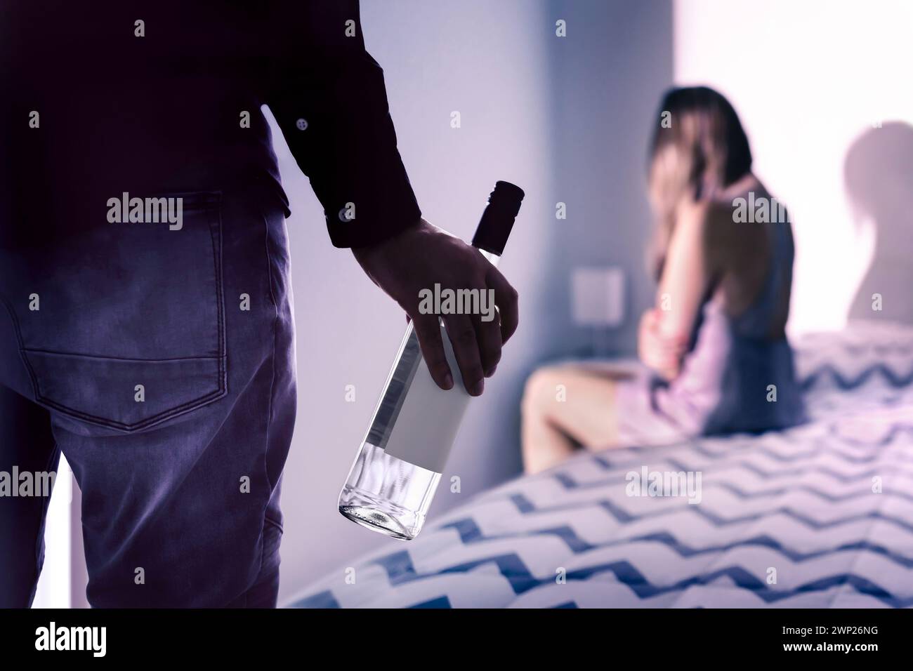 Alcohol and domestic violence. Drunk partner and husband with addiction. Wife in fear. Violent addict spouse. Couple fight. Problem in family home. Stock Photo