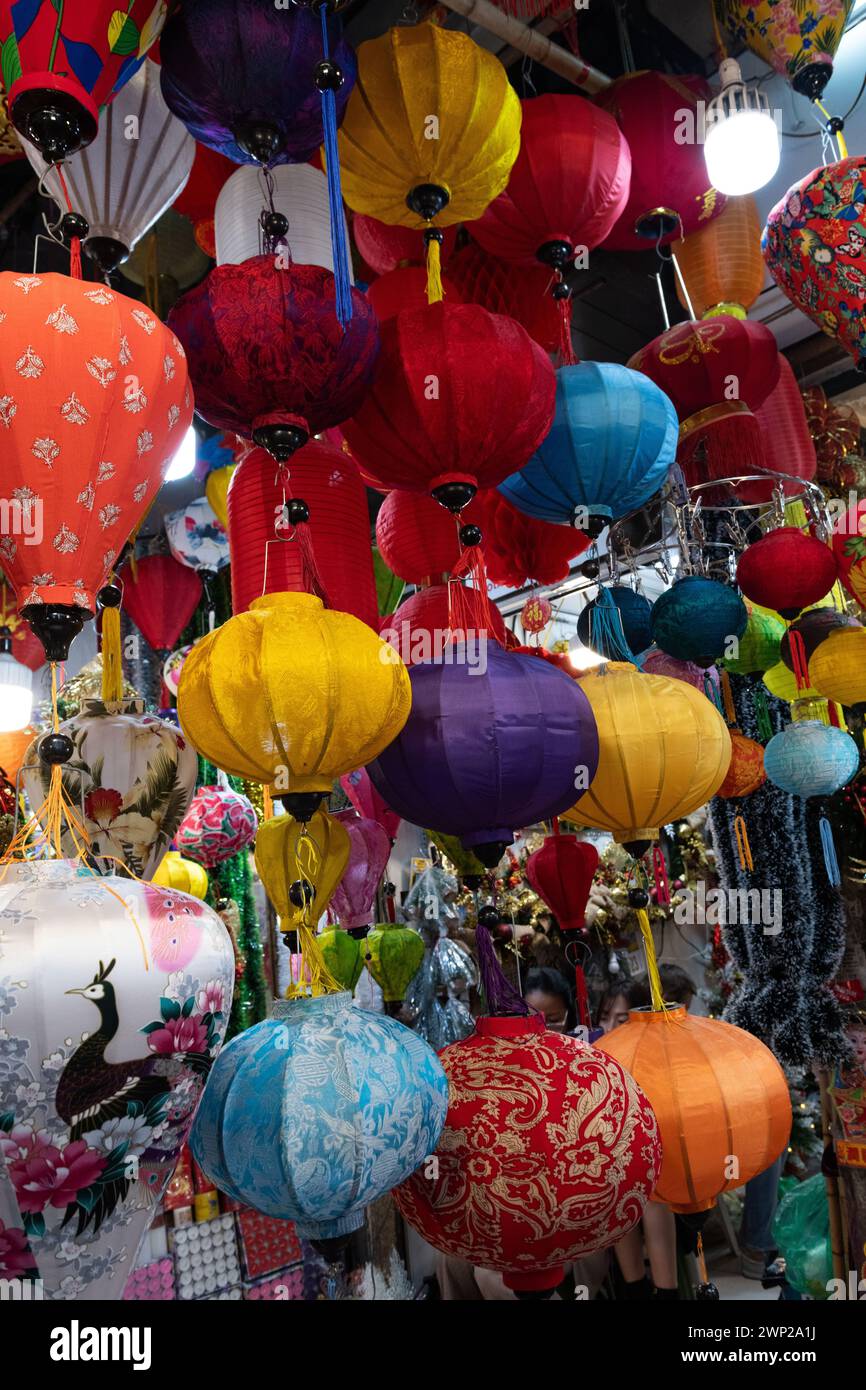 Traditional Vietnamese silk lantern light covers in various colors and