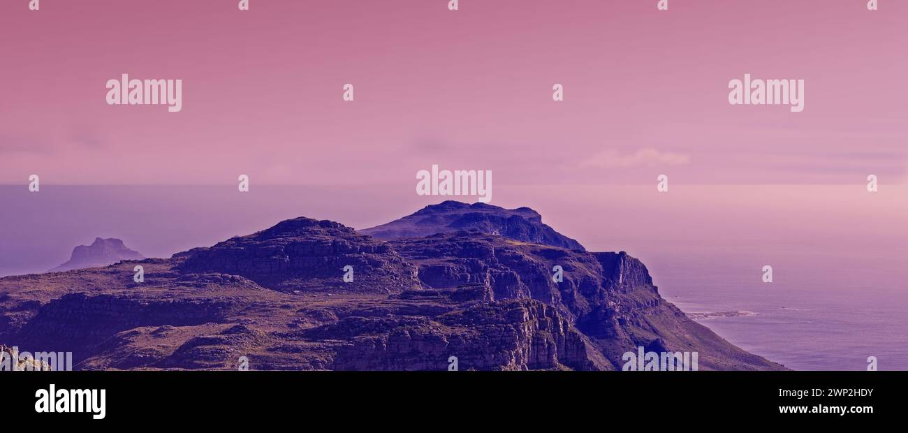Mountain top, nature and pink sky background for travel, hiking and eco friendly tourism with banner of Cape Town. Aerial view of sunset, landscape Stock Photo