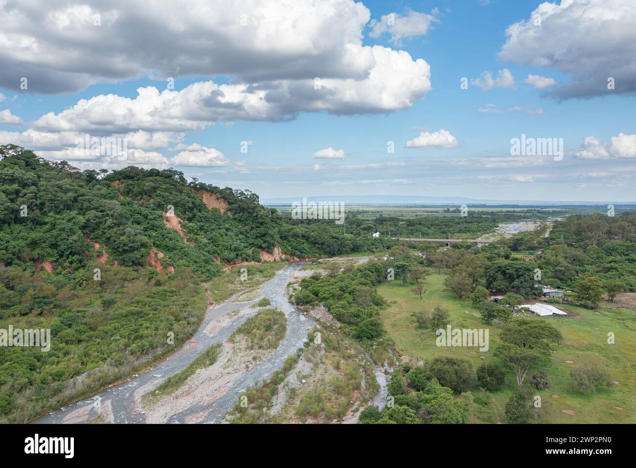 Bridge on Pan-American Route number 9 over the De las Conchas River in Metan province of Salta Argentina seen from a drone. Stock Photo