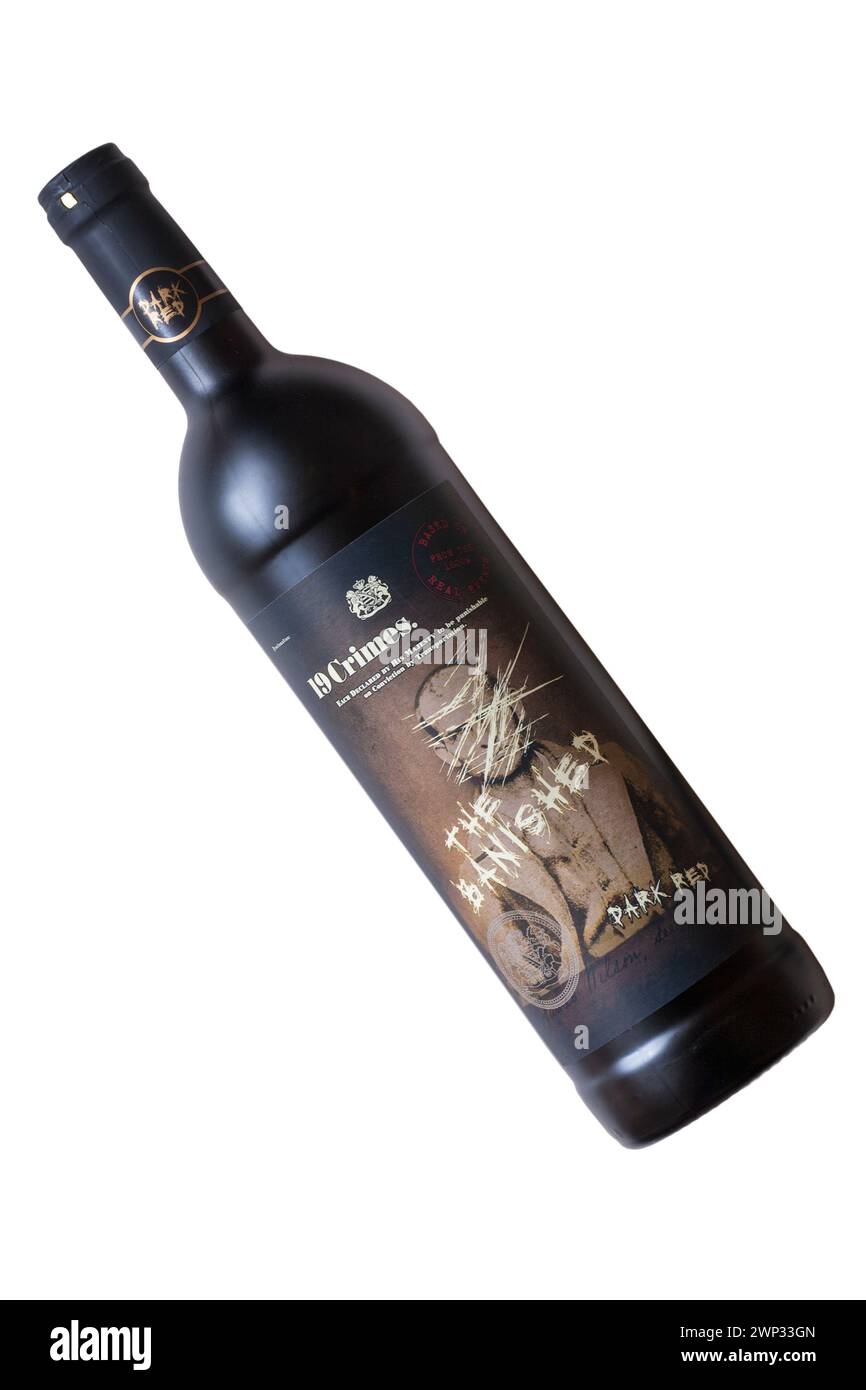 bottle of 19 Crimes The Banished dark red wine isolated on white