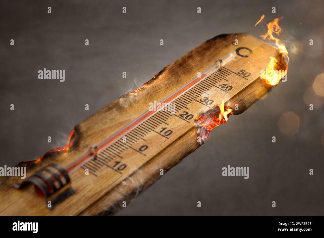Burning Thermometer Showing High Temperature Stock Photo