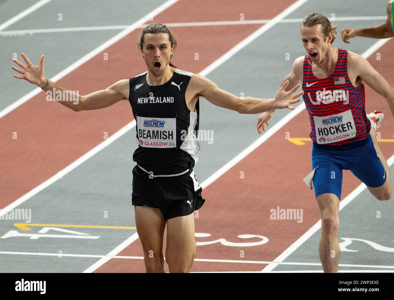 Geordie Beamish of New Zealand kicks past Cole Hocker of the USA to win