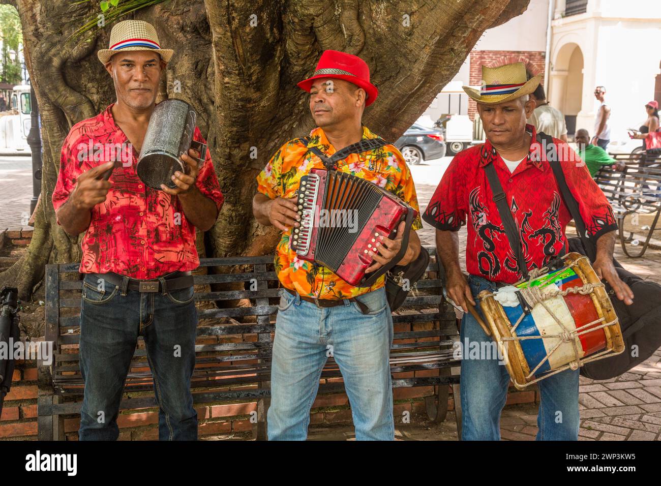 A Dominican merengue band plays in Columbus Park in the Colonial City ...