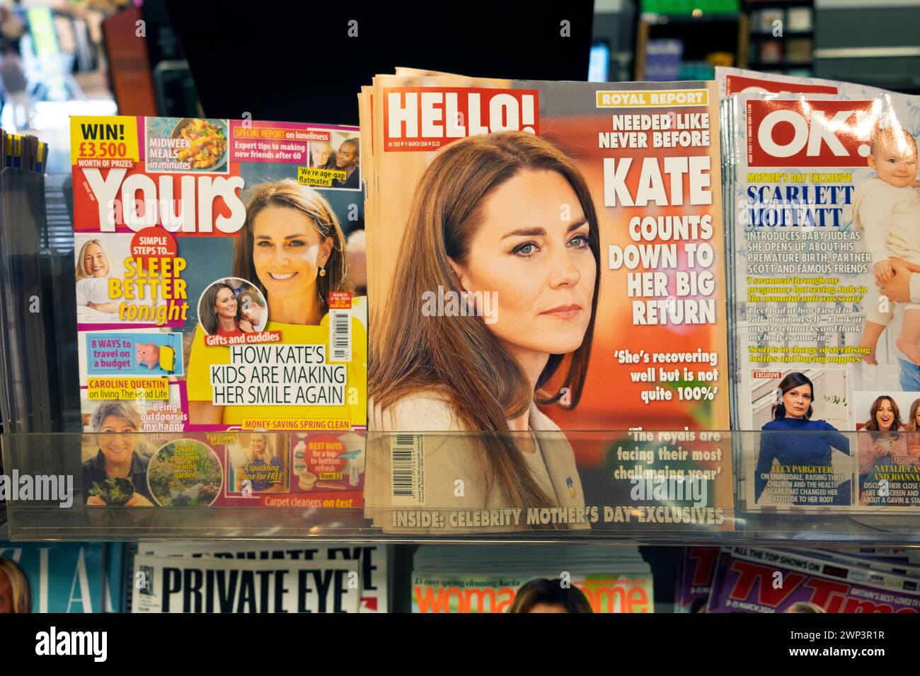 Kate Middleton, Princess of Wales, Duchess of Cambridge on front cover of Hello Magazine on a supermarket shelf with magazines March 2024 London UK Stock Photo