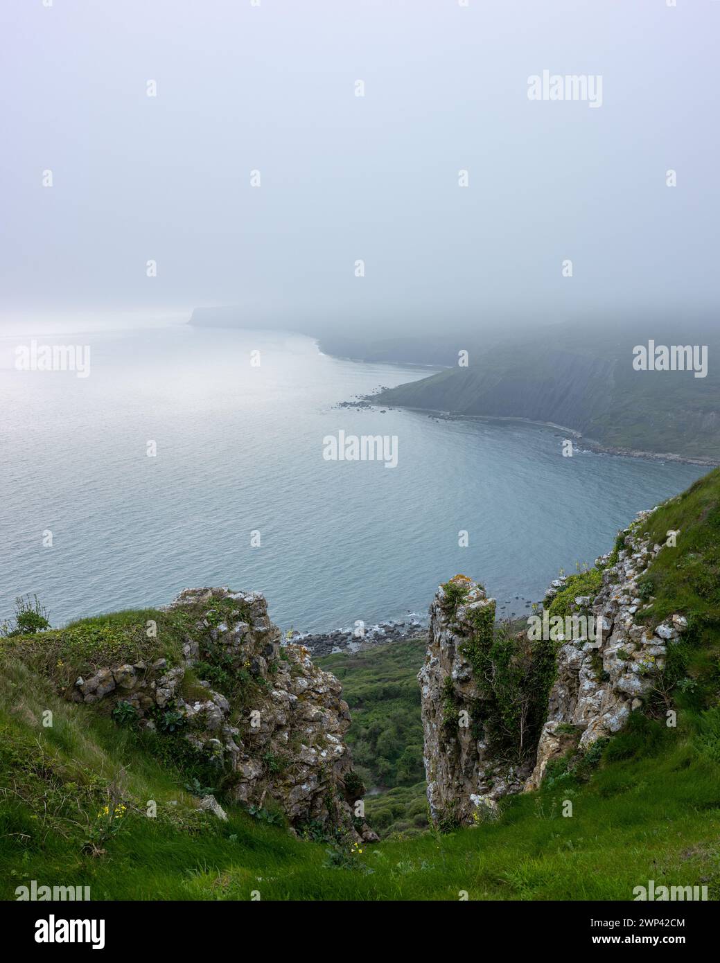 Chapmans Pool, Dorset with low cloud, taken at cloud level Stock Photo