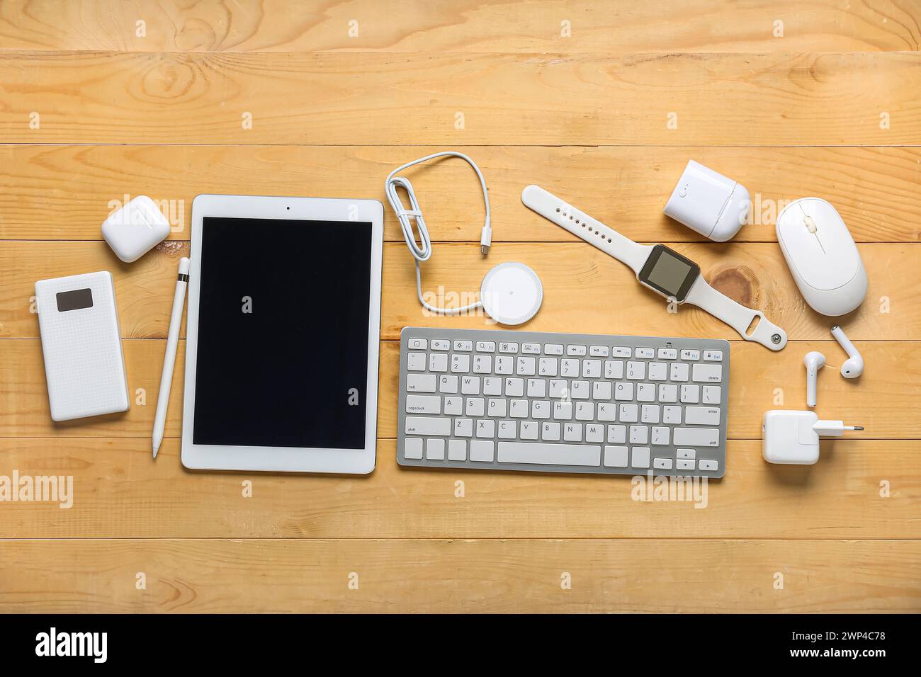 Composition with different modern gadgets on wooden background Stock Photo