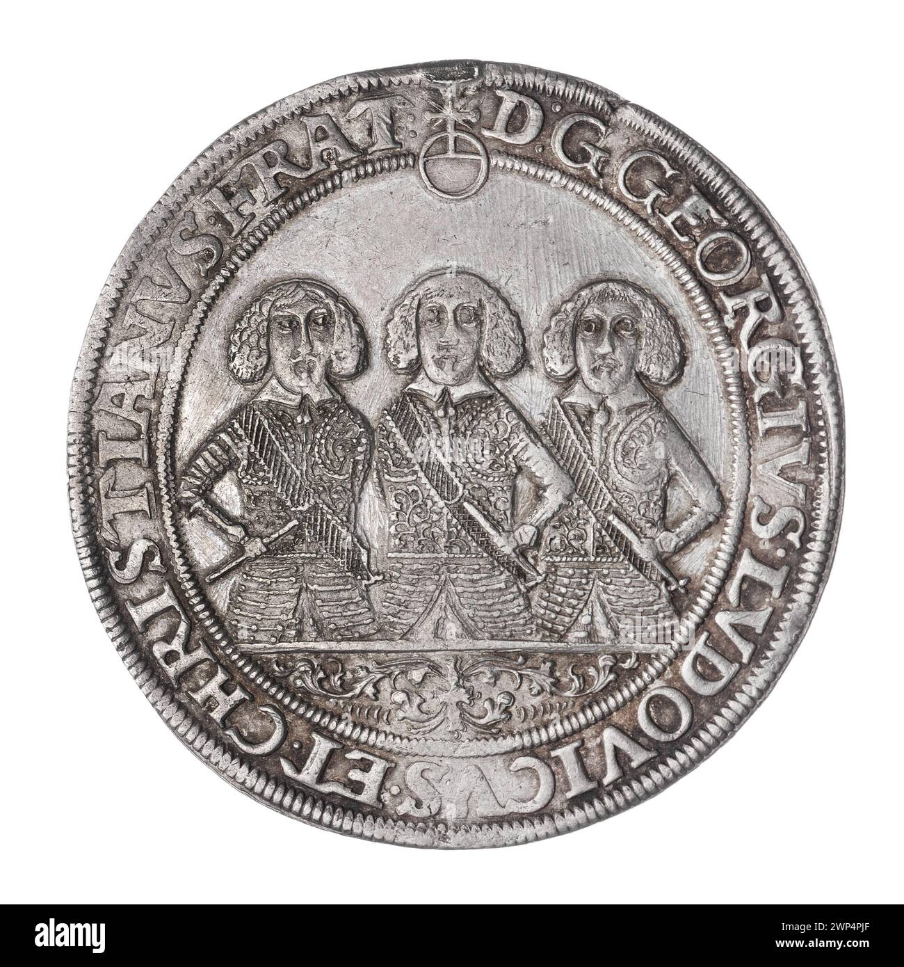 A thaler coin dated 1657 depicting Princes Jerzy III, Ludwik IV, and ...