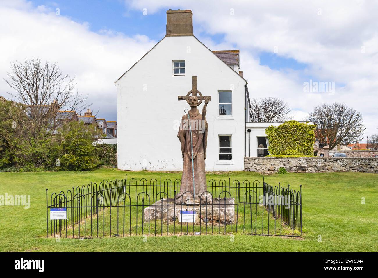 Lindisfarne, Holy Island, Berwick-upon-Tweed, Northumberland, England, Great Briton, United Kingdom. May 1, 2022. Statue of Saint Aidan, by Kathleen P Stock Photo