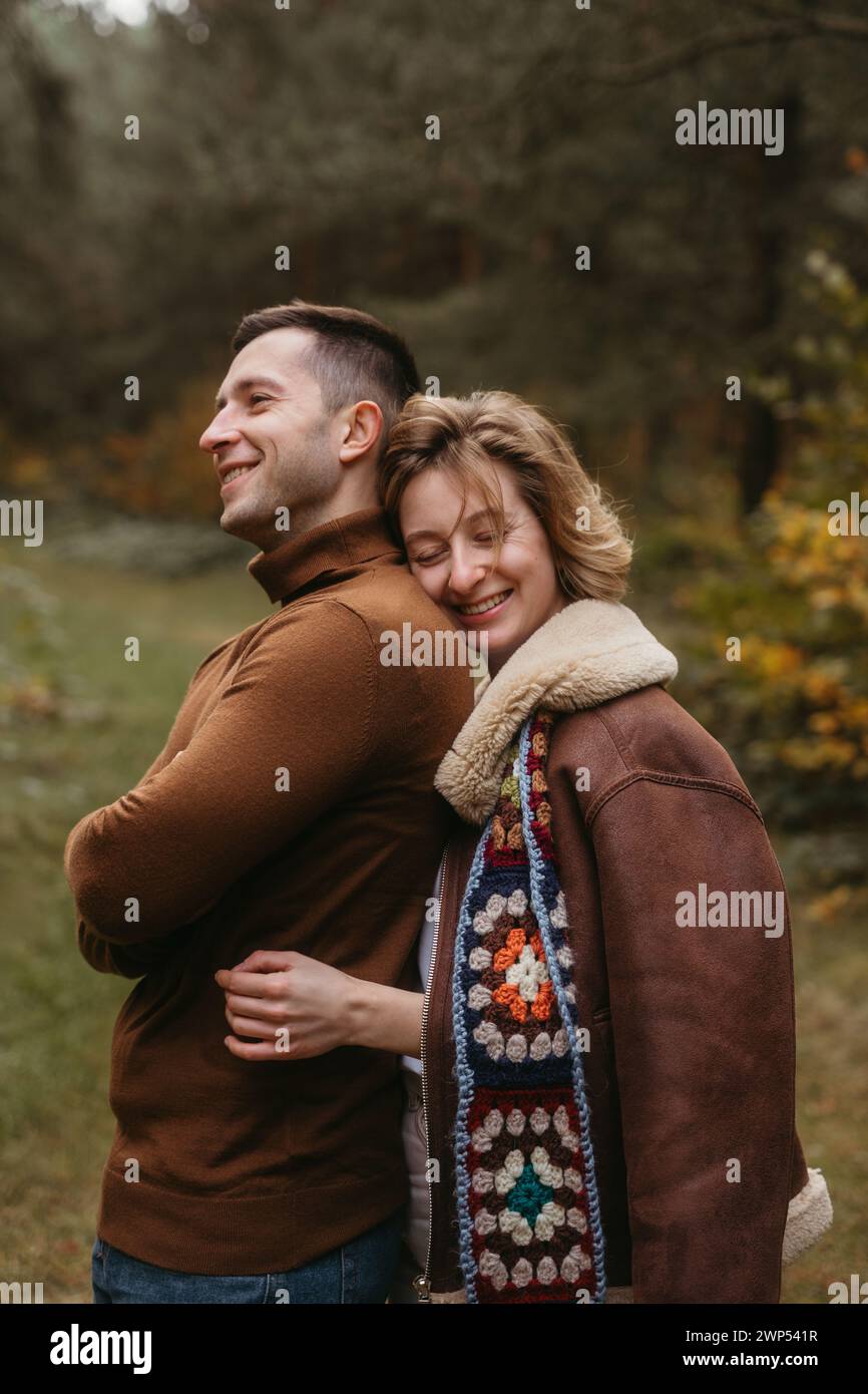 Couple hugs in winter forest hi-res stock photography and images - Alamy