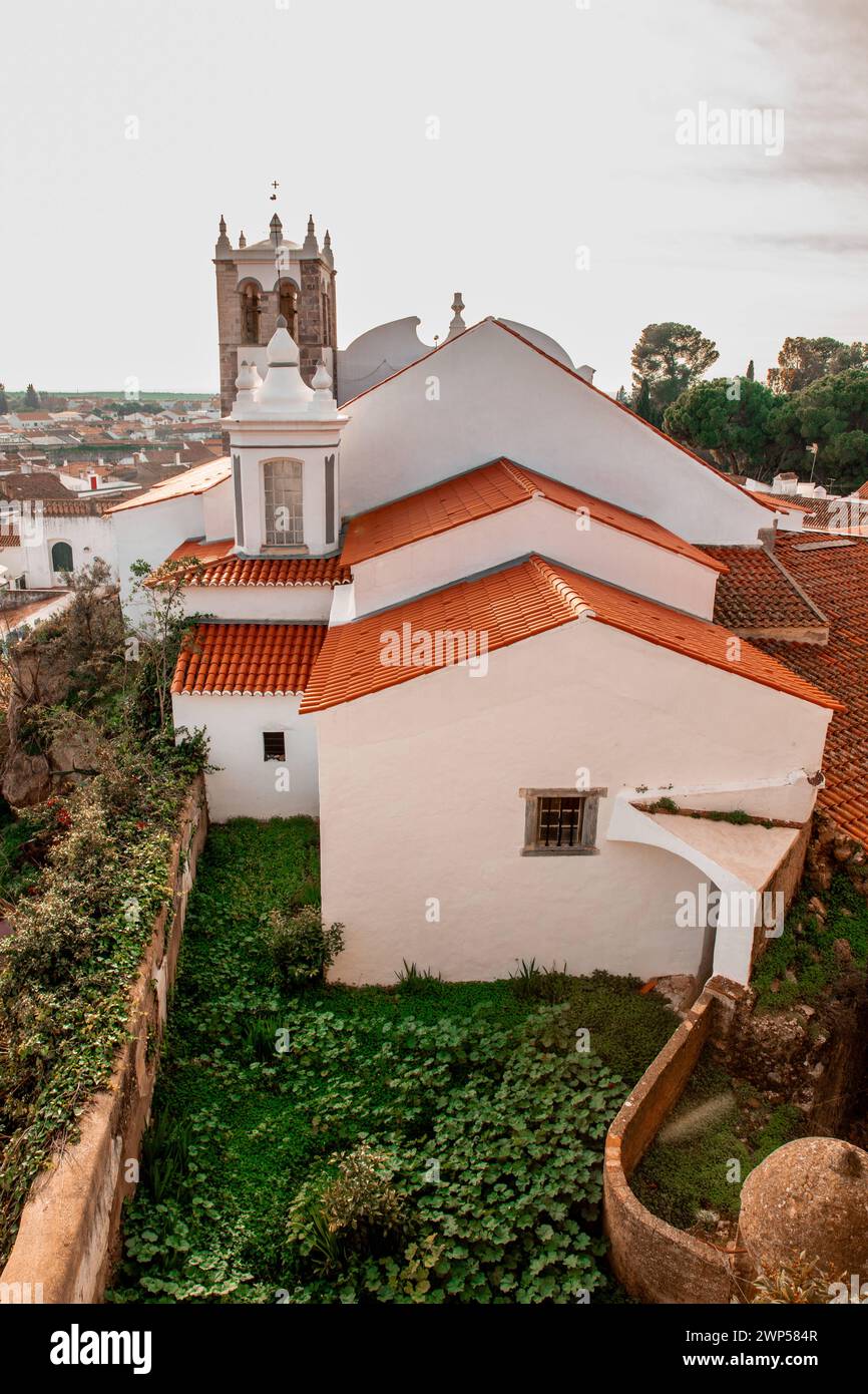 Portugal Cultural travel, city trips and interesting sights View of the rooftops of the city Serpa and the Church of Santa Maria in Alentejo Stock Photo