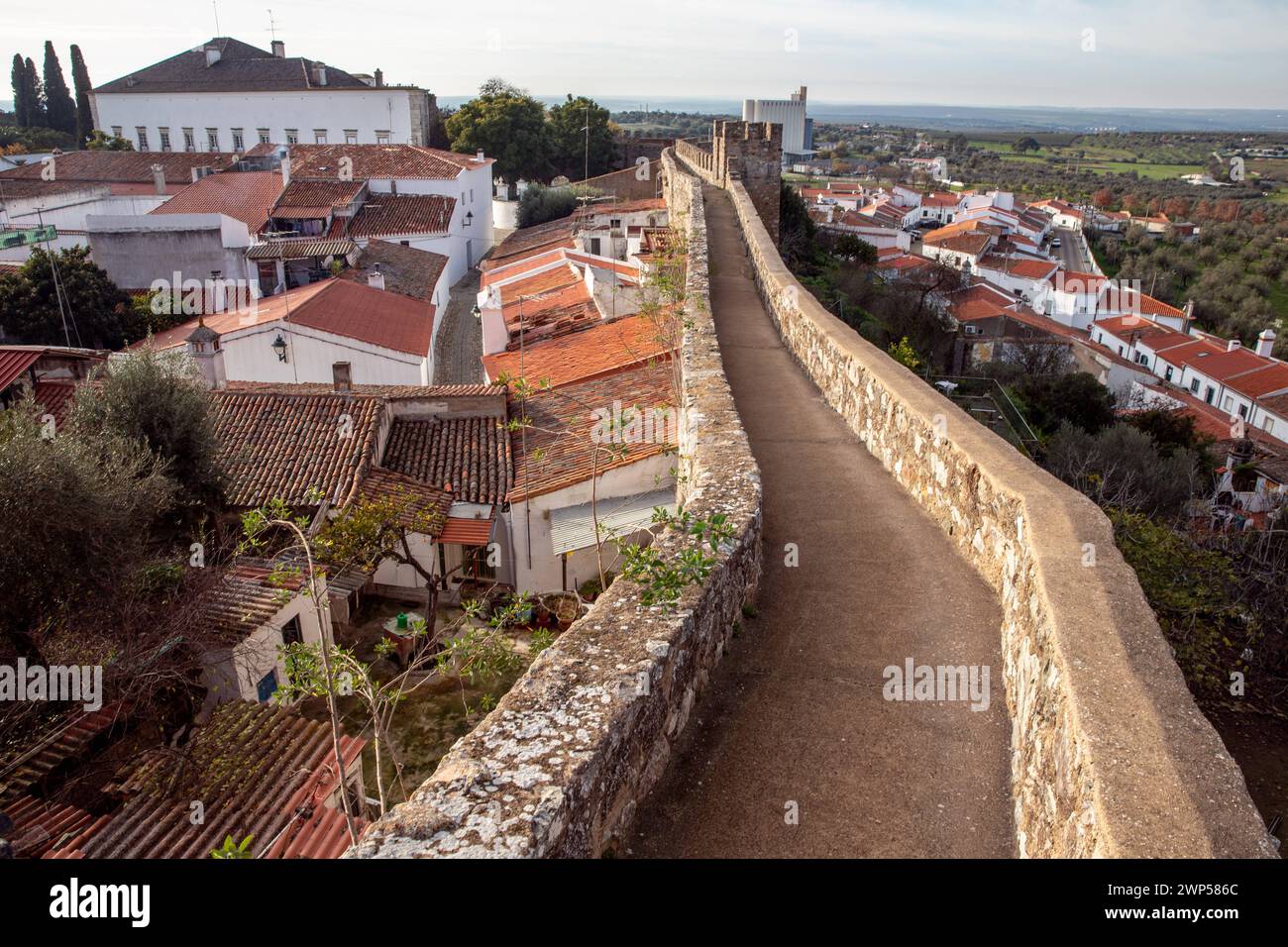 Portugal Cultural travel, city trips and interesting sights View of the rooftops and the castle wall of the city of Serpa in the Alentejo region Stock Photo