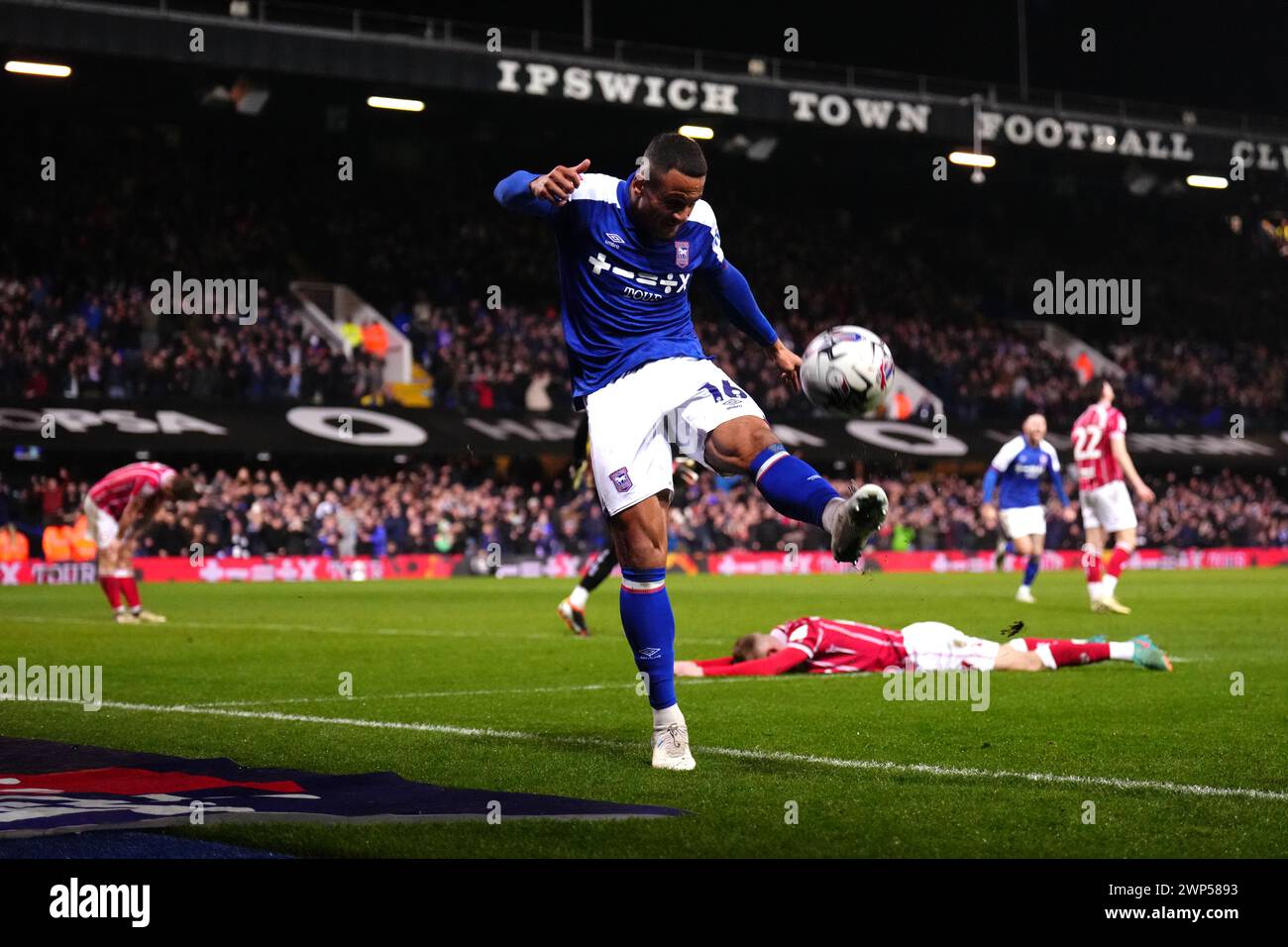 Ipswich Town's Ali Al-Hamadi celebrates their side's third goal of the game, scored by team-mate Leif Davis (not pictured) as Bristol City players look dejected during the Sky Bet Championship match at Portman Road, Ipswich. Picture date: Tuesday March 5, 2024. Stock Photo