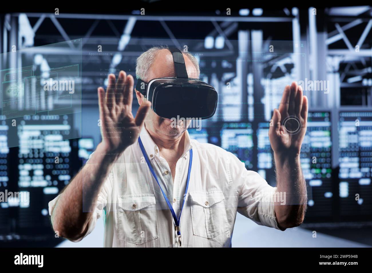 Senescent technical support consultant immersed in virtual reality at data center, doing equipment maintenance. Serviceman using VR headset to optimize server racks performance, checking code lines Stock Photo