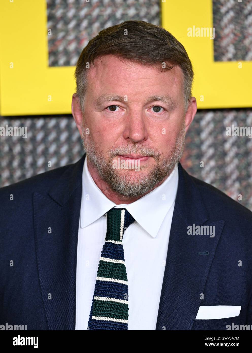 London, UK. March 5th, 2025. Guy Ritchie arriving at The Gentlemen UK