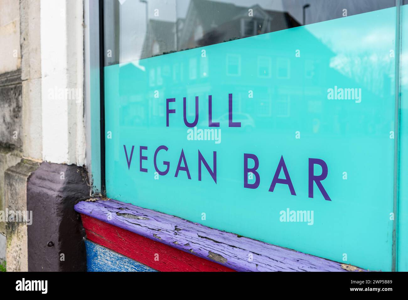 Full Vegan Bar signage in a window at a Vegan food and drinks restaurant, Southampton, England, UK Stock Photo