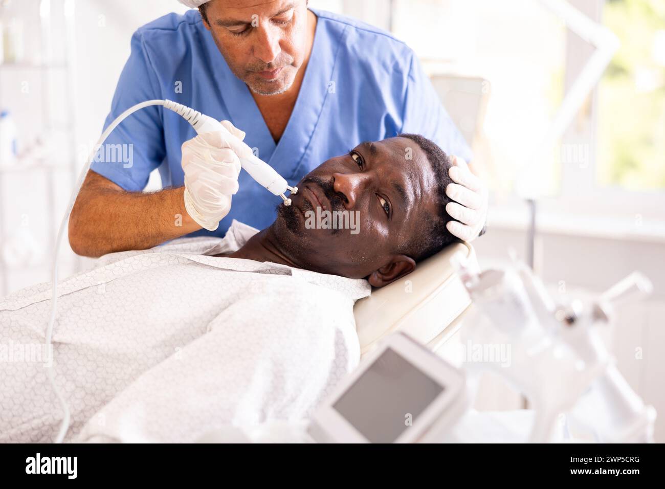 African american man tightening hi-res stock photography and images - Alamy