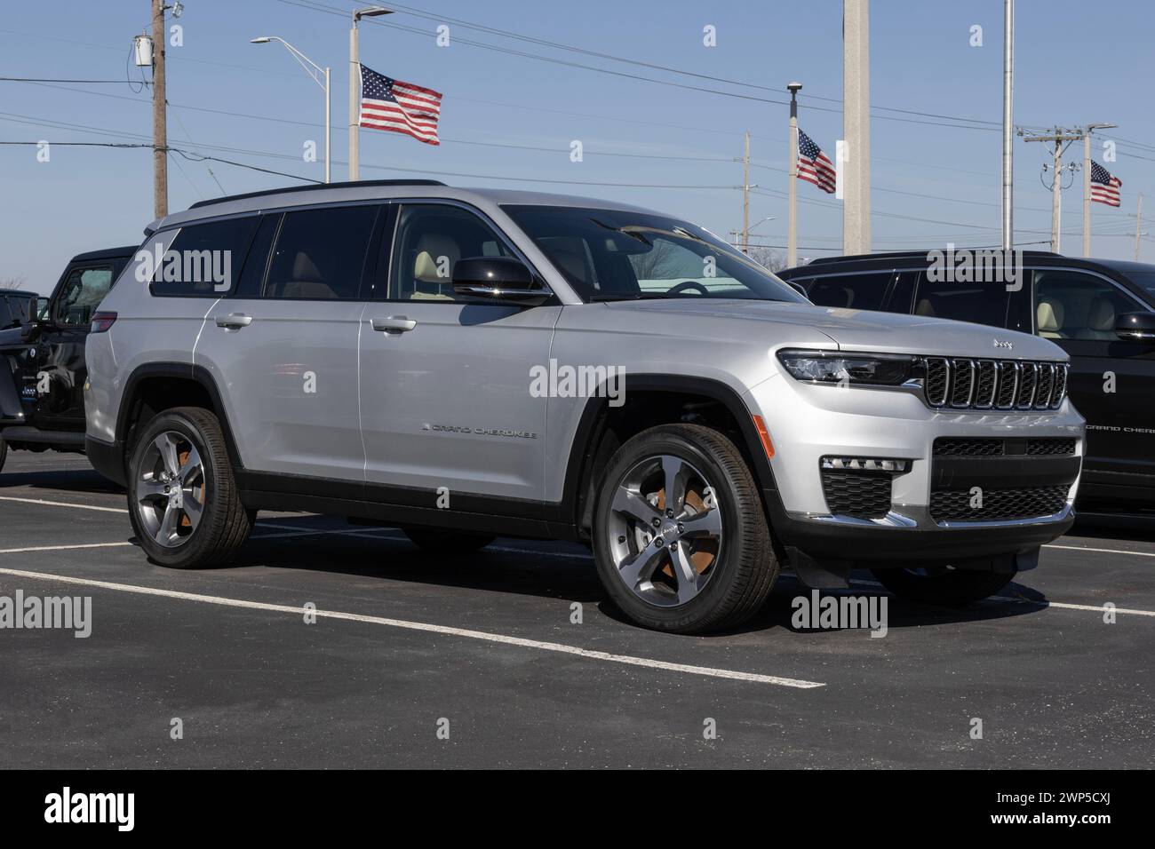 Noblesville - February 3, 2024: Jeep Grand Cherokee Limited display at a dealership. Jeep offers the Grand Cherokee in Laredo and Trailhawk models. MY Stock Photo