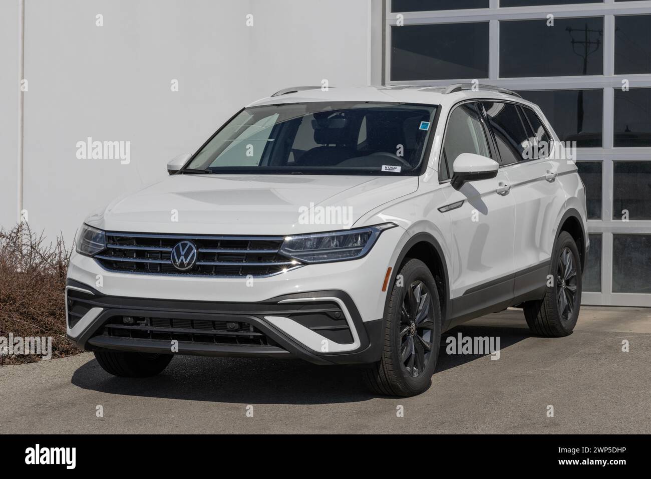 Noblesville - February 3, 2024: Volkswagen Tiguan SE display at a dealer. VW offers the Tiguan in S, SE, SE R-Line Black, and SEL R-Line models. MY:20 Stock Photo