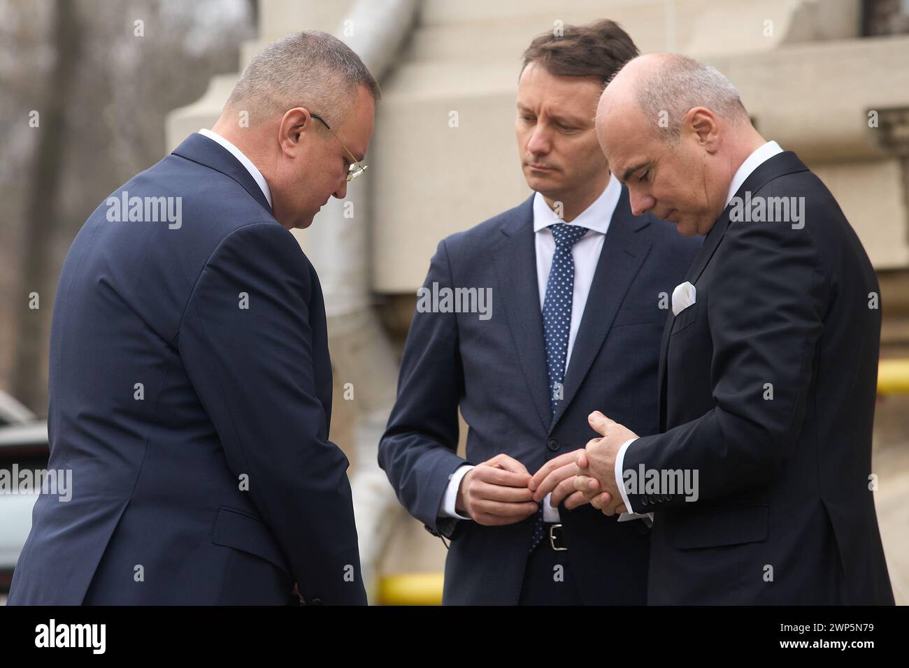 Bucharest, Romania - 5th Mar, 2024: Nicolae Ciuca (L), head of Romanian Senate and president of the National Liberal Party (PNL), Siegfried Muresan (C), Romanian Member of the European Parliament, and Rares Bogdan (R), MEP and First Vice-President of National Liberal Party, await the arrival of the PPE president Manfred Weber, at the PNL Headquarters in Bucharest. The European People's Party (EPP) bring together 2000 participants from 44 countries to hold its 2024 Congress on March 6-7, 2024 in Bucharest with a program focused on preparations for the European Parliament elections in June and c Stock Photo