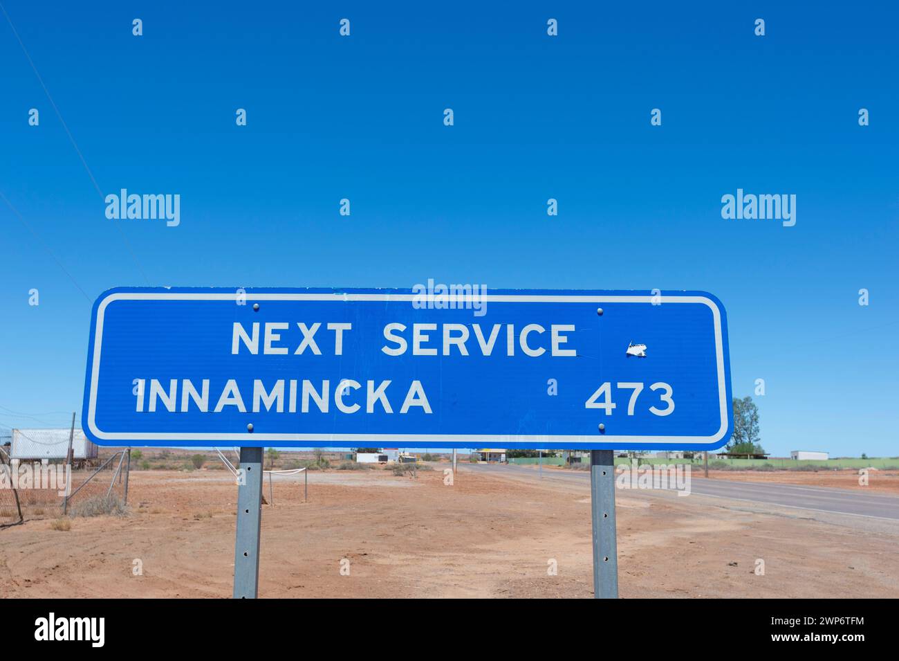 Road sign on the Strzelecki Track, showing next service at Innamincka, South Australia, SA, Australia Stock Photo