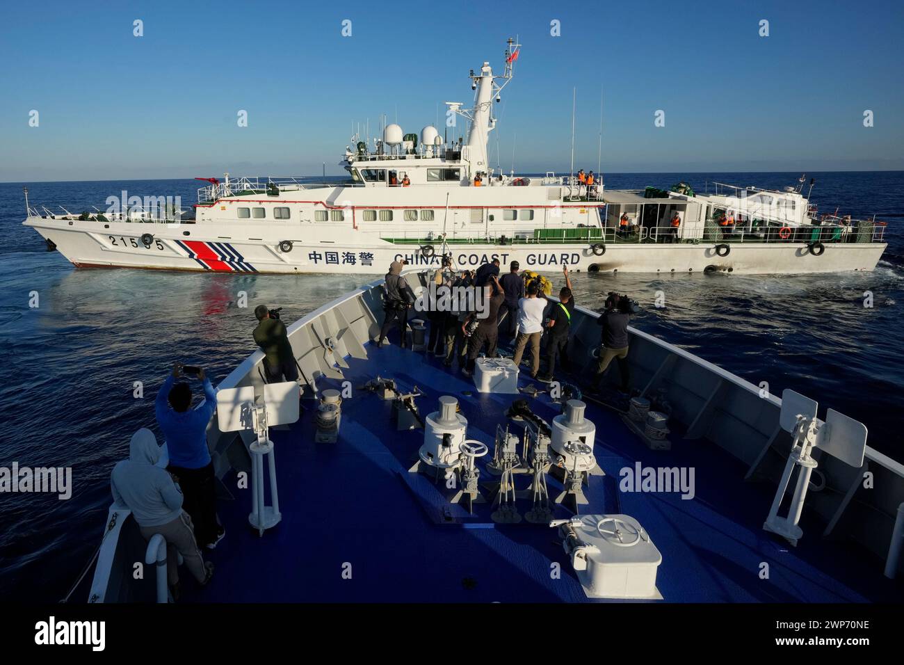 Journalists Report As A Chinese Coast Guard Ship Blocks The Path Of