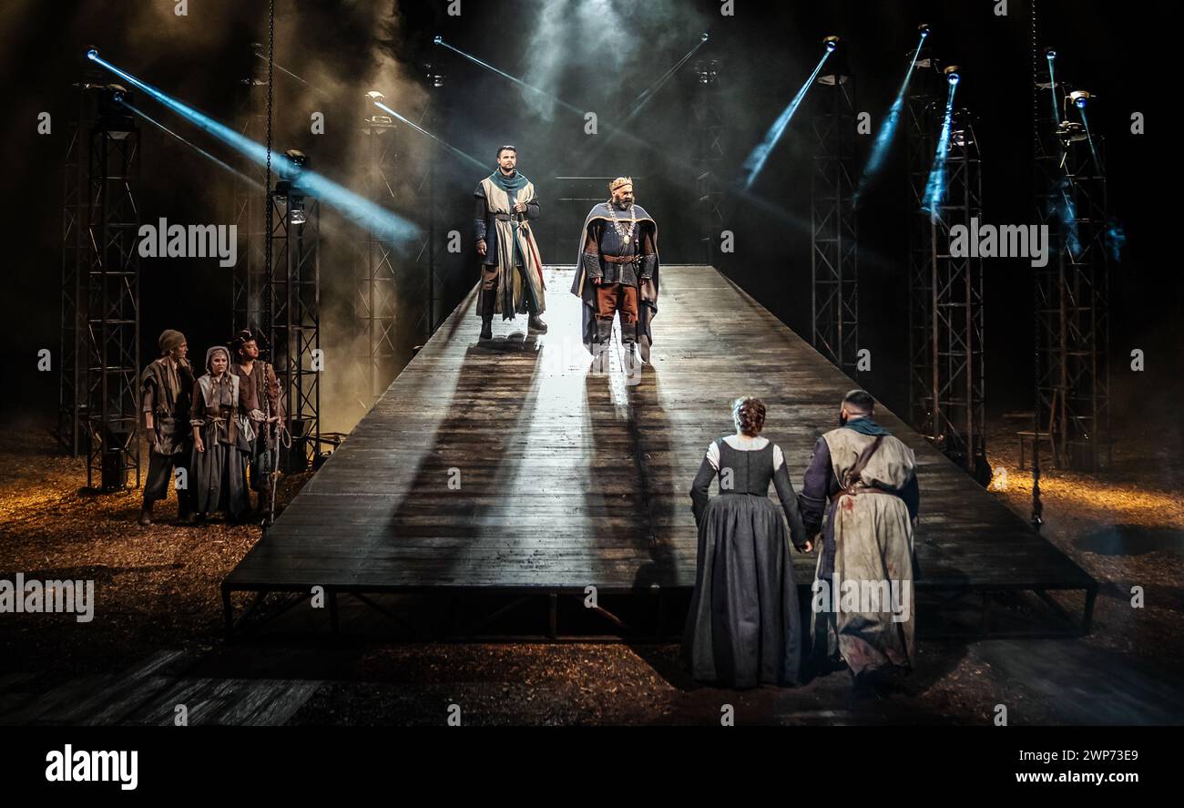 Cast members on stage during the dress rehearsal for Macbeth, directed