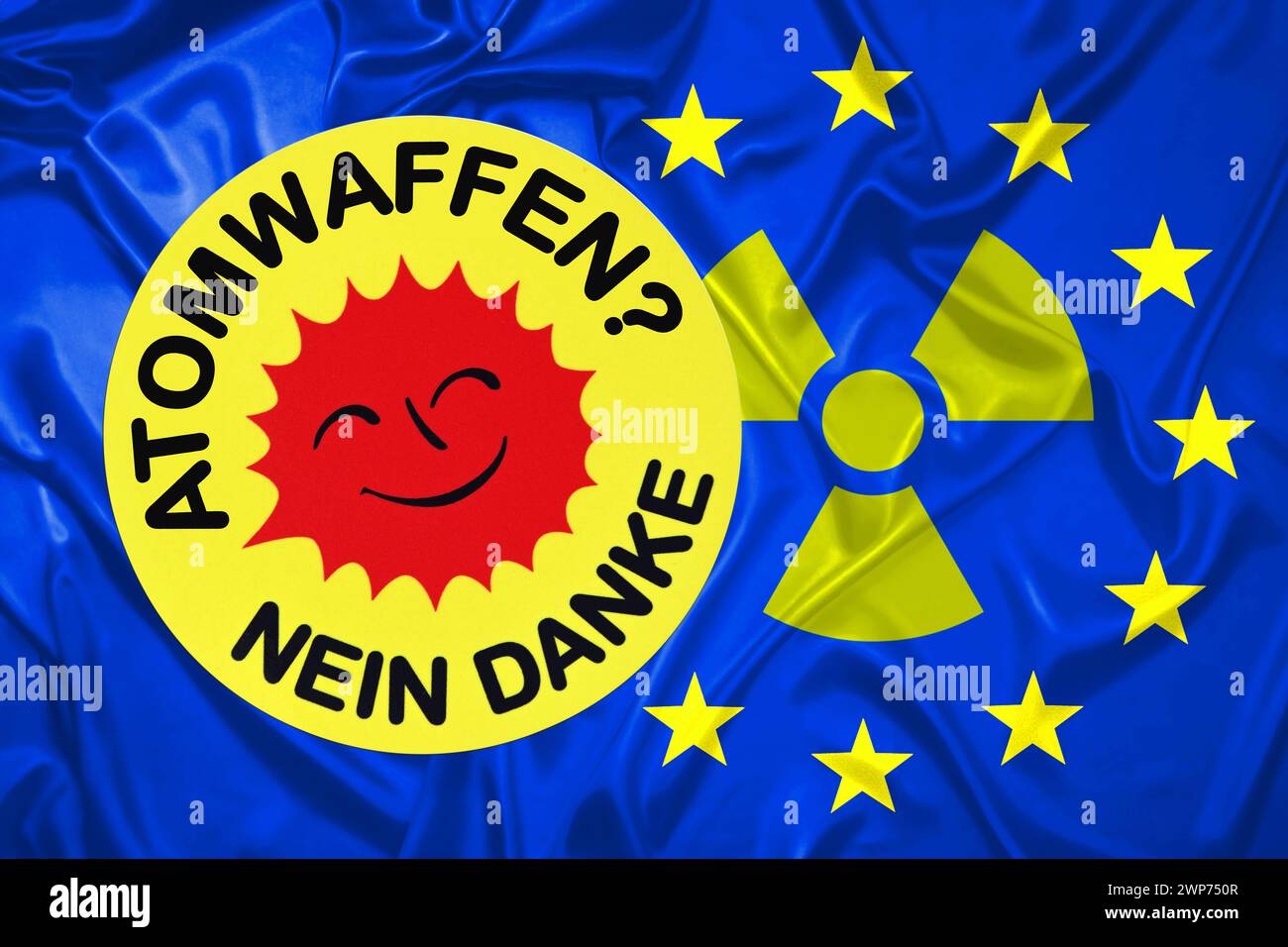FOTOMONTAGE, Aufkleber mit Aufschrift Atomwaffen? - Nein danke auf EU-Fahne mit Radioaktivitätszeichen Stock Photo