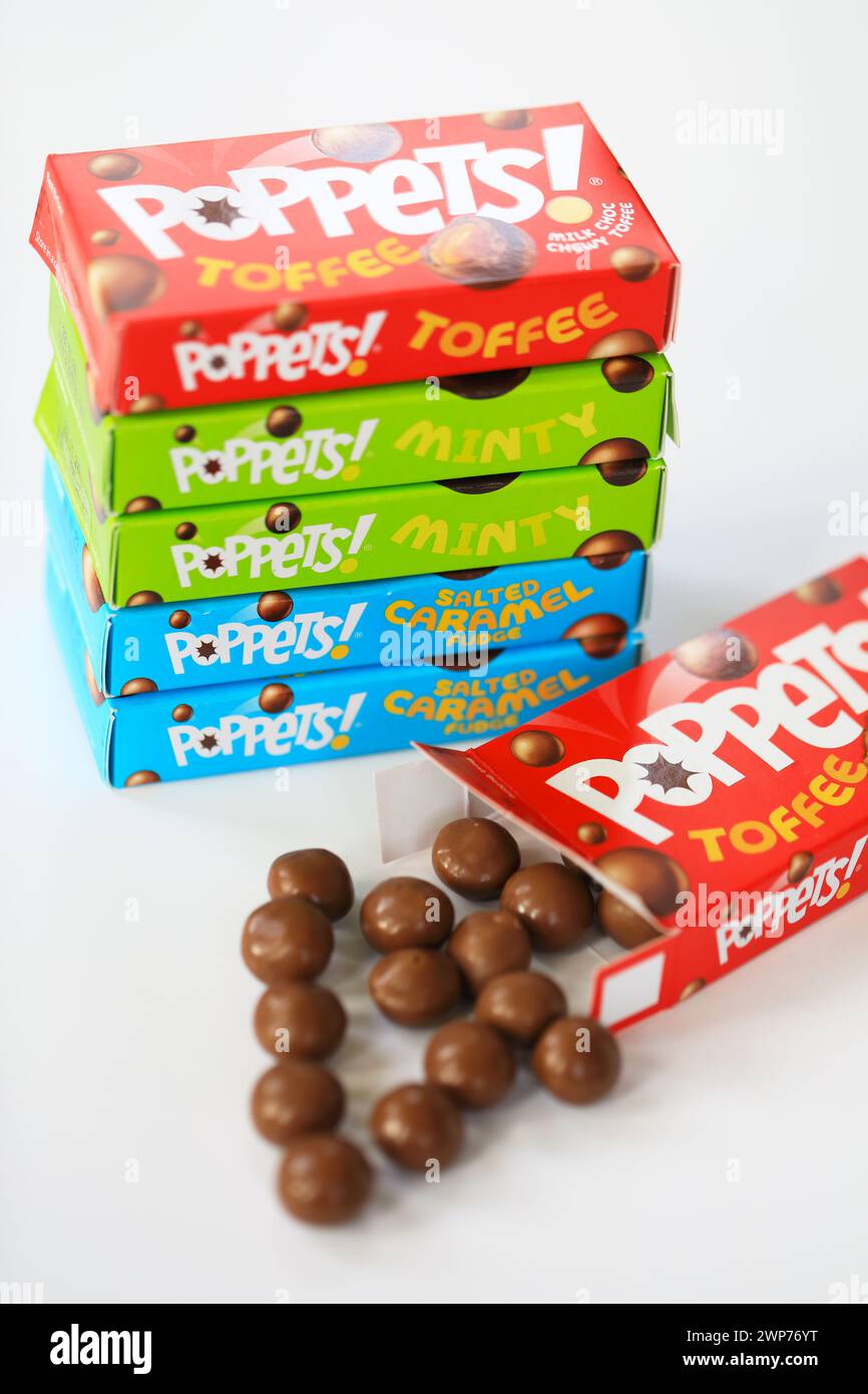 Poppets, chocolate covered sweets, in the traditional style box Stock Photo