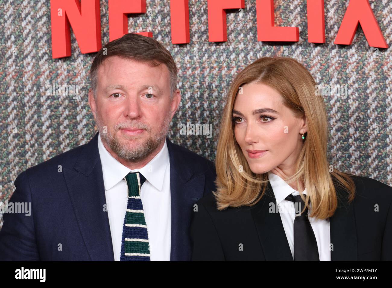 Guy Ritchie and Jacqui Ainsley, THE GENTLEMEN UK Series Global Premiere, Theatre Royal, Drury Lane, London, UK, 05 March 2024, Photo by Richard Goldsc Stock Photo
