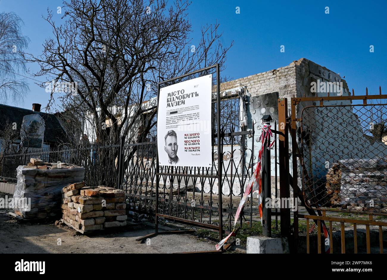 LVIV, UKRAINE - MARCH 5, 2024 - The Shukhevych Museum lies in ruins as seen during a commemorating event for Roman Shukhevych, the military leader of the Ukrainian Insurgent Army (UPA), on the 74th anniversary of his death, Lviv, western Ukraine. The Roman Shukhevych Memorial Museum caught fire on the morning of January 1, 2024, in the settlement of Bilohorshcha on the outskirts of Lviv as a result of falling Shahed drone debris. Stock Photo