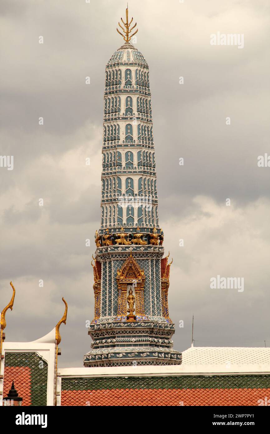 A tall tower with intricate white and blue designs at the top Stock Photo