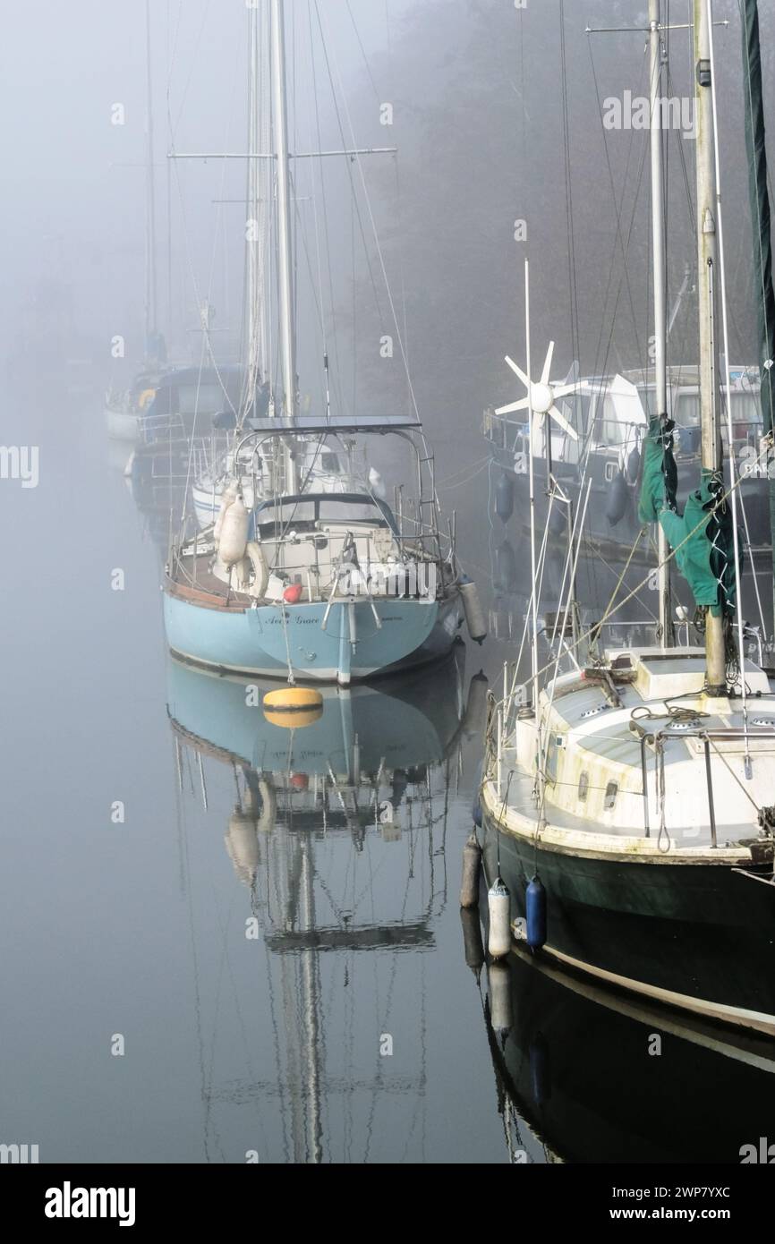 Lydney, 6th March 2024. Historic Lydney Harbour in the Forest of Dean in the morning mist. Credit: JMF News/Alamy Live News Stock Photo