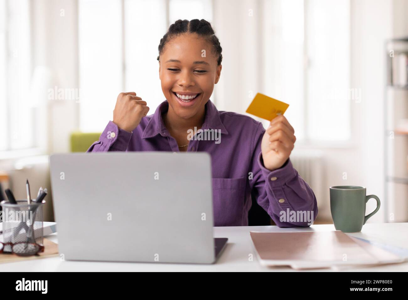 Excited african teen girl laptop hi-res stock photography and images ...