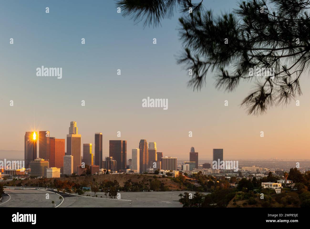 A scenic view of Los Angeles skyline at sunset in California Stock Photo