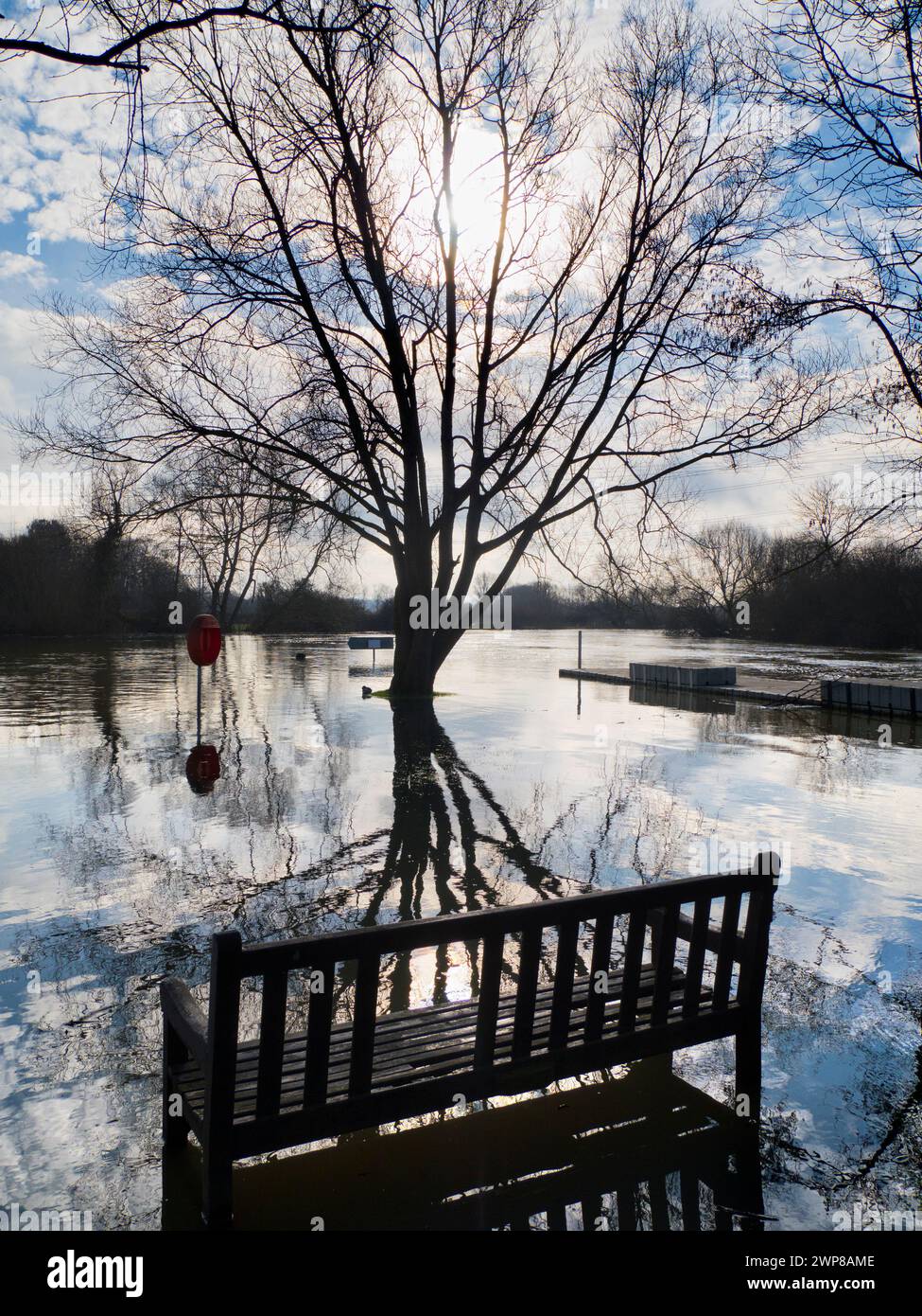 An early view of the Thames at Sandford, early on a winter's day.  But the scene today is different. After weeks of incessant rain, the Thames has ris Stock Photo
