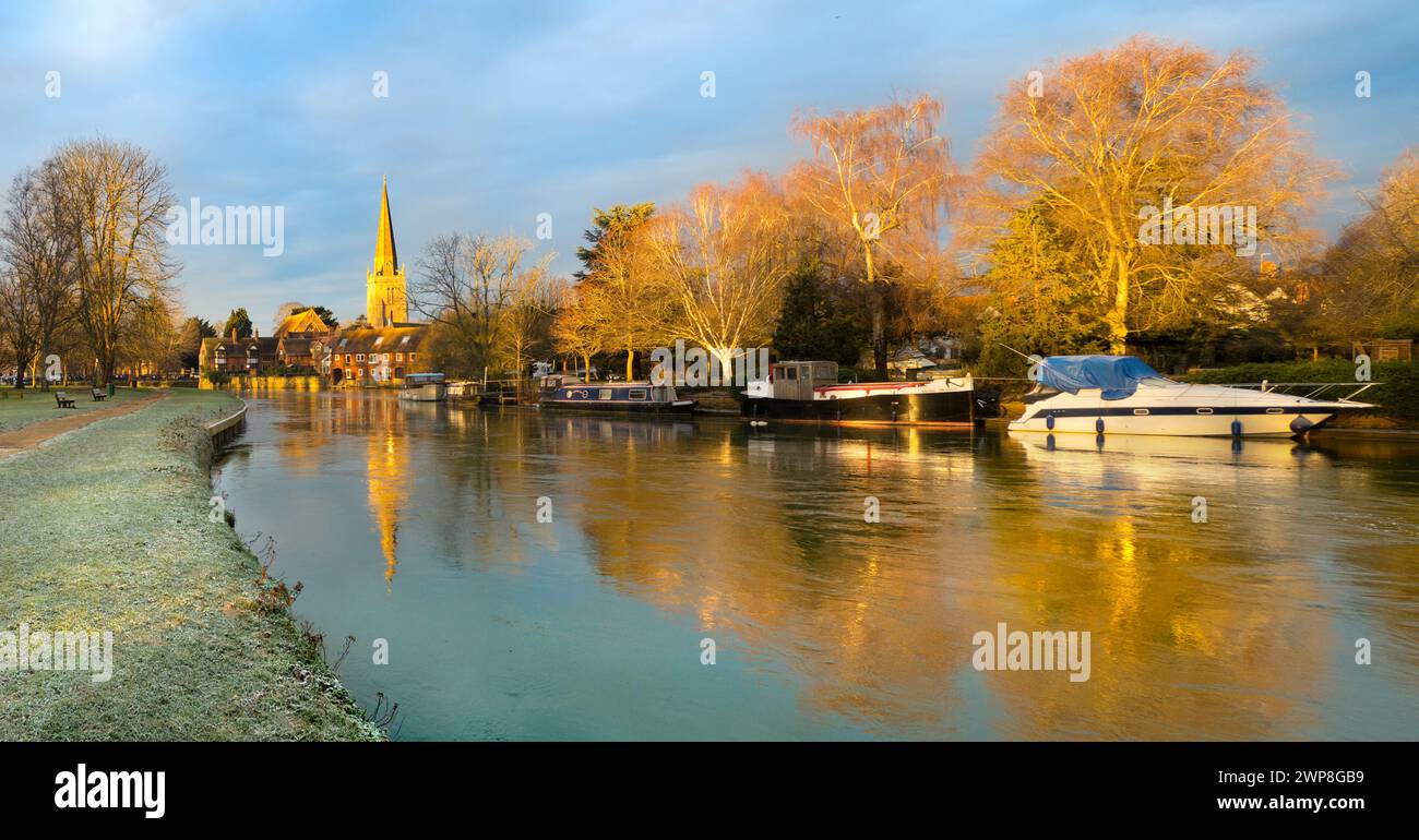 A fine view of the Thames at Abingdon on a glowing winter morning. We're on the south bank of the river, looking downstream towards St Helen's Wharf - Stock Photo